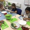 Preparing our salad which definitely resembles the “Very Hungry Caterpillar”…we agree to healthy minds and healthy bodies.